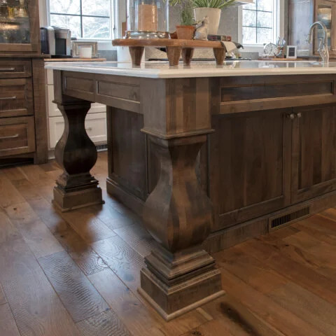 view of custom made dark oak cabinets and table