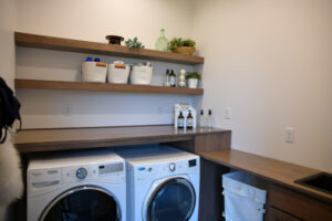 dark brown laundry room cabinetry
